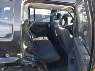 2011 Jeep Liberty Sport with VIN 1J4PN2GK2BW515322, listed as a IAAI auction lot 41597381 with 122,044 mi miles. Bid and sale history available at carsss.com. Image 8.
