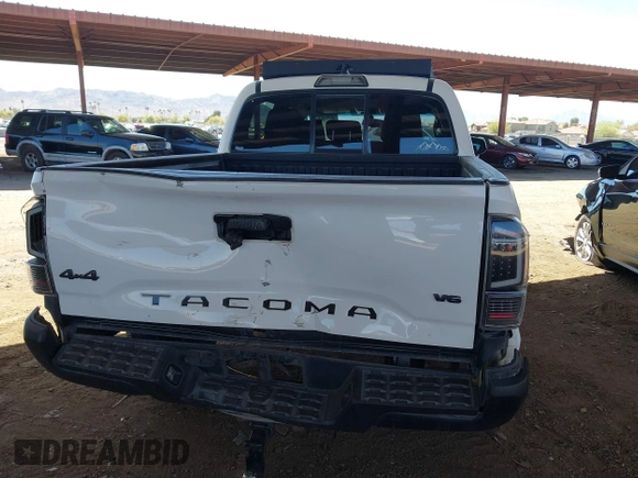 2016 Toyota Tacoma SR with VIN 5TFCZ5ANXGX028464, listed as a IAAI auction lot 41834385 with 124,407 mi miles and . Bid and sale history available at DreamBid. Image 6.