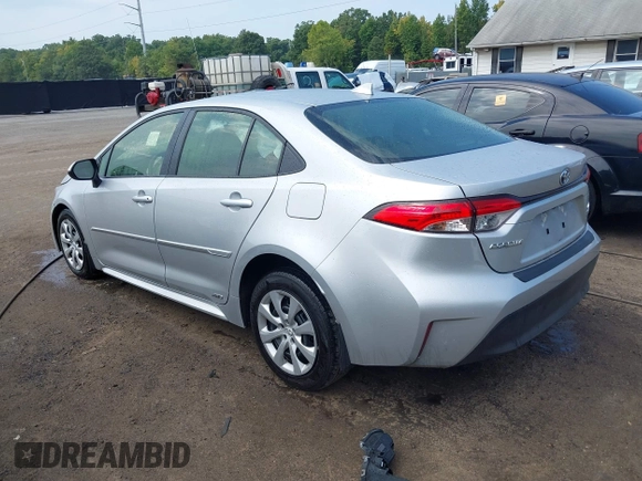 2023 Toyota Corolla Hybrid LE with VIN JTDBDMHE5P3000797, listed as a IAAI auction lot 40206015 with 22,371 mi miles. Bid and sale history available at carsss.com. Image 3.