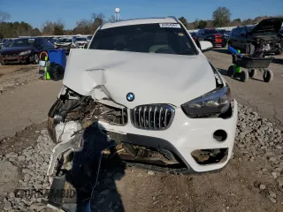 2019 BMW X1 sDrive28i with VIN WBXHU7C53K3H45694, listed as a Copart auction lot 85804084 with 151,645 mi miles and Salvage Title. Bid and sale history available at DreamBid. Image 5.