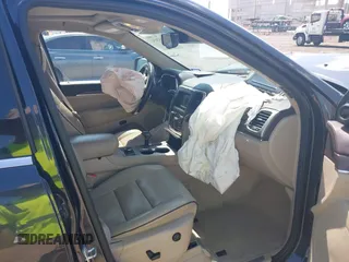2015 Jeep Grand Cherokee High Altitude with VIN 1C4RJFCG5FC807394, listed as a IAAI auction lot 42452034 with 72,011 mi miles and . Bid and sale history available at DreamBid. Image 5.