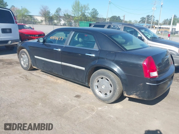 2005 Chrysler 300 with VIN 2C3JA53G55H122612, listed as a IAAI auction lot 41971677 with Not Provided miles. Bid and sale history available at carsss.com. Image 3.
