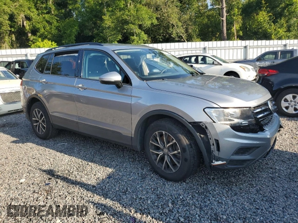 2021 Volkswagen Tiguan S with VIN 3VV1B7AX9MM023655, listed as a Copart auction lot 64159445 with 55,795 mi miles and Salvage title. Bid and sale history available at DreamBid. Image 4.