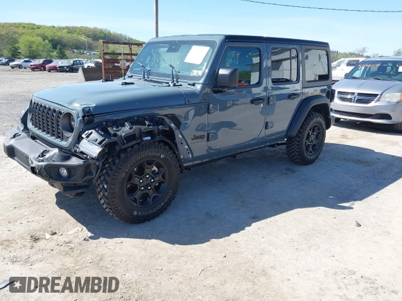 2024 Jeep Wrangler Sport S with VIN 1C4PJXDN2RW351741, listed as a IAAI auction lot 42122651 with 4,241 mi miles and . Bid and sale history available at DreamBid. Image 18.