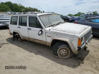 1993 Jeep Cherokee Country with VIN 1J4FJ78S6PL504836, listed as a Copart auction lot 59434224 with 150,581 mi miles and Non Repairable. Bid and sale history available at carsss.com. Image 4.