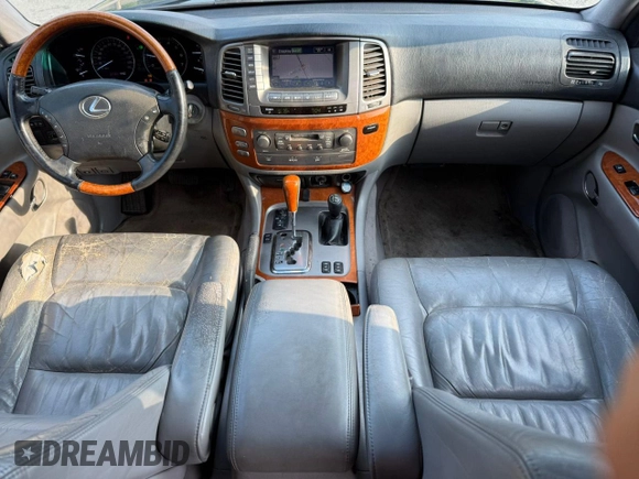 2004 Lexus LX 470 with VIN JTJHT00W44354386, listed as a Copart auction lot 63816455 with 389,442 mi miles and Clean title. Bid and sale history available at DreamBid. Image 9.