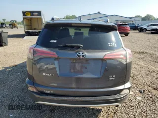 2016 Toyota RAV4 XLE with VIN JTMRFREV0GJ082234, listed as a Copart auction lot 64941855 with 193,270 mi miles and Salvage title. Bid and sale history available at DreamBid. Image 6.