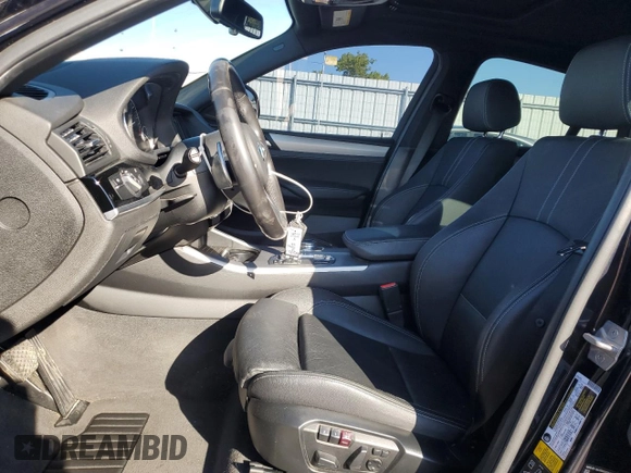 2018 BMW X4 M40i with VIN 5UXXW7C54J0Z44932, listed as a Copart auction lot 55973605 with 101,479 mi miles and Salvage title. Bid and sale history available at DreamBid. Image 7.