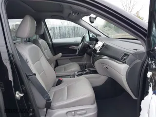 2016 Honda Pilot EX-L with VIN 5FNYF6H5XGB010700, listed as a IAAI auction lot 41895396 with 137,153 mi miles. Bid and sale history available at carsss.com. Image 5.