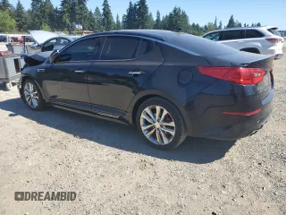 2015 Kia Optima SX Turbo with VIN 5XXGR4A63FG517153, listed as a Copart auction lot 65068985 with 153,482 mi miles and Salvage title. Bid and sale history available at DreamBid. Image 2.