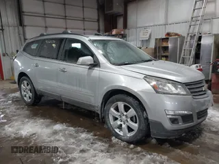 2016 Chevrolet Traverse LT z VIN 1GNKRGKD7GJ301142, wystawiony jako IAAI lot #41628700 z przebiegiem 143 182 mil mil oraz . Historia ofert i sprzedaży dostępna na DreamBid. Obrazek 1.