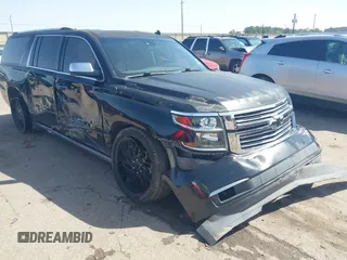 2015 Chevrolet Suburban LTZ with VIN 1GNSCKKC4FR184745, listed as a IAAI auction lot 41687313 with 225,794 mi miles and . Bid and sale history available at DreamBid. Image 1.