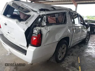 2019 Chevrolet Suburban Premier with VIN 1GNSKJKJ2KR354283, listed as a IAAI auction lot 39548082 with Not Provided miles and . Bid and sale history available at DreamBid. Image 4.