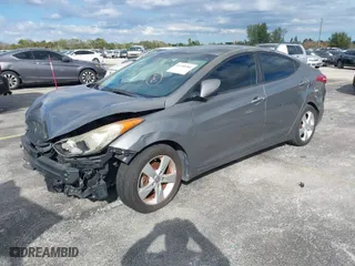 2013 Hyundai Elantra GLS PZEV with VIN 5NPDH4AE1DH360432, listed as a IAAI auction lot 41440366 with 106,047 mi miles. Bid and sale history available at carsss.com. Image 2.
