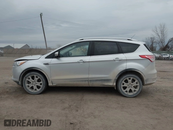 2015 Ford Escape Titanium with VIN 1FMCU9J92FUA60166, listed as a IAAI auction lot 41914080 with 103,122 mi miles and . Bid and sale history available at DreamBid. Image 14.