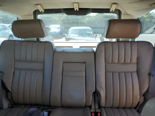 2002 Land Rover Range Rover z VIN SALPM164X2A463563, wystawiony jako Copart lot #73380104 z przebiegiem 174 462 mil mil oraz Czysty tytuł • Clean title. Historia ofert i sprzedaży dostępna na DreamBid. Obrazek 10.