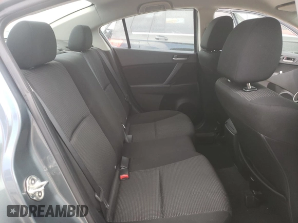 2013 Mazda 3 i SV z VIN JM1BL1TFXD1804831, wystawiony jako Copart lot #60029405 z przebiegiem 83 633 mil mil oraz Szkoda całkowita • Salvage title. Historia ofert i sprzedaży dostępna na DreamBid. Obrazek 10.