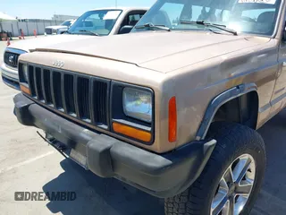 1999 Jeep Cherokee SE with VIN 1J4FF28S4XL592788, listed as a IAAI auction lot 42560002 with 189,258 mi miles and . Bid and sale history available at DreamBid. Image 6.