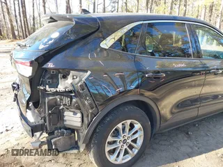 2020 Ford Escape SE z VIN 1FMCU0G6XLUA07056, wystawiony jako IAAI lot #41156940 z przebiegiem 103 707 mil mil oraz . Historia ofert i sprzedaży dostępna na DreamBid. Obrazek 17.