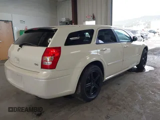 2006 Dodge Magnum z VIN 2D8GZ57286H100782, wystawiony jako IAAI lot #41816780 z przebiegiem 203 839 mil mil oraz . Historia ofert i sprzedaży dostępna na DreamBid. Obrazek 4.