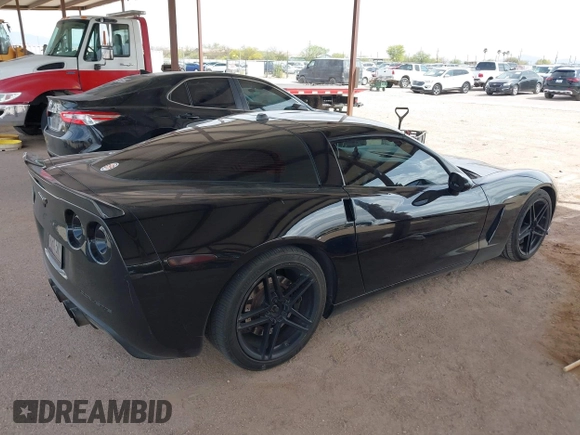 2005 Chevrolet Corvette with VIN 1G1YY24U255101774, listed as a IAAI auction lot 41964756 with 136,116 mi miles. Bid and sale history available at carsss.com. Image 4.