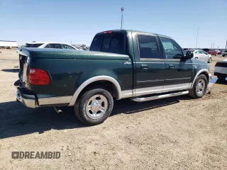 2001 Ford F-150 XLT with VIN 1FTRW07L21KF52515, listed as a Copart auction lot 48303905 with 236,567 mi miles and Salvage title. Bid and sale history available at DreamBid. Image 3.