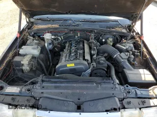 1992 Volvo 960 z VIN YV1KW9510N0005570, wystawiony jako Copart lot #70897964 z przebiegiem 254 533 mil mil oraz Szkody całkowita. Historia ofert i sprzedaży dostępna na DreamBid. Obrazek 11.