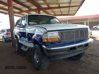 1996 Ford Bronco Custom with VIN 1FMEU15H3TLB30609, listed as a IAAI auction lot 42053896 with 238,597 mi miles. Bid and sale history available at carsss.com. Image 6.