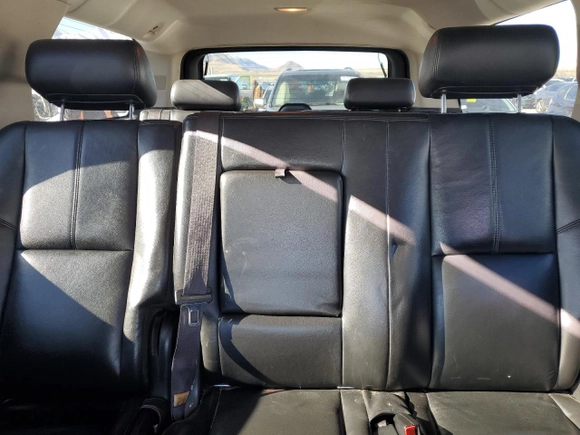 2010 Chevrolet Suburban LT with VIN 1GNUKJE31AR256608, listed as a Copart auction lot 80932674 with 228,456 mi miles and Salvage Title. Bid and sale history available at carsss.com. Image 10.