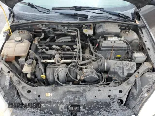 2007 Ford Focus S z VIN 1FAHP34N27W144992, wystawiony jako Copart lot #65571385 z przebiegiem 194 933 mil mil oraz Szkoda całkowita • Salvage title. Historia ofert i sprzedaży dostępna na DreamBid. Obrazek 11.