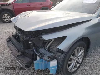 2016 Infiniti Q50 2.0t Premium with VIN JN1CV7AR3GM250973, listed as a IAAI auction lot 41099907 with 115,173 mi miles. Bid and sale history available at carsss.com. Image 19.