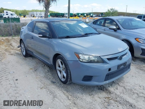2012 Scion tC with VIN JTKJF5C79C3043661, listed as a IAAI auction lot 42020903 with 184,891 mi miles. Bid and sale history available at carsss.com. Image 1.