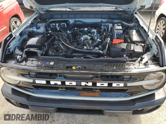 2021 Ford Bronco z VIN 1FMDE5CP4MLA65927, wystawiony jako Copart lot #74809974 z przebiegiem 41 296 mil mil oraz Nie do naprawy • Non repairable. Historia ofert i sprzedaży dostępna na DreamBid. Obrazek 12.