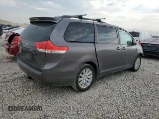 2012 Toyota Sienna XLE with VIN 5TDDK3DC7CS039221, listed as a Copart auction lot 64188804 with 180,811 mi miles and Salvage Title. Bid and sale history available at carsss.com. Image 3.