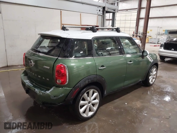 2015 MINI Countryman with VIN WMWZB3C50FWR43714, listed as a IAAI auction lot 41589778 with 93,404 mi miles and . Bid and sale history available at DreamBid. Image 4.