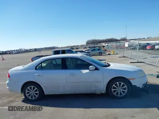 2006 Mercury Milan with VIN 3MEFM07136R651790, listed as a IAAI auction lot 41476480 with 149,677 mi miles and . Bid and sale history available at DreamBid. Image 14.