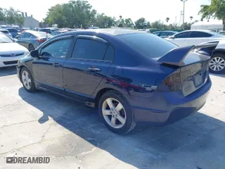 2008 Honda Civic Sdn EX with VIN 1HGFA15858L052702, listed as a IAAI auction lot 42031789 with 235,312 mi miles. Bid and sale history available at carsss.com. Image 3.