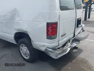 2009 Ford Econoline Cargo Commercial with VIN 1FTNE14W09DA38068, listed as a IAAI auction lot 41690071 with 182,337 mi miles and . Bid and sale history available at DreamBid. Image 13.