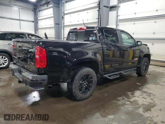 2021 Chevrolet Colorado 4WD Z71 with VIN 1GCGTDEN8M1171810, listed as a Copart auction lot 57409115 with 100,579 mi miles and Salvage title. Bid and sale history available at DreamBid. Image 3.