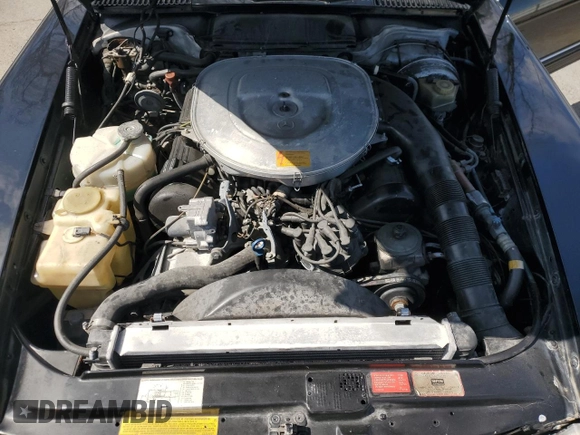 1988 Mercedes-Benz 560 SL z VIN WDBBA48D0JA085307, wystawiony jako Copart lot #51533115 z przebiegiem 83 302 mil mil oraz Szkoda całkowita • Salvage title. Historia ofert i sprzedaży dostępna na DreamBid. Obrazek 11.