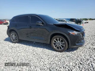 2021 Mazda CX-5 Signature with VIN JM3KFBEY5M0439676, listed as a Copart auction lot 52823285 with 41,811 mi miles and Non Repairable. Bid and sale history available at carsss.com. Image 4.
