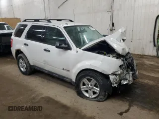 2012 Ford Escape Hybrid z VIN 1FMCU5K37CKB20209, wystawiony jako Copart lot #47182745 z przebiegiem Nie podano mil oraz Szkoda całkowita • Salvage title. Historia ofert i sprzedaży dostępna na DreamBid. Obrazek 4.
