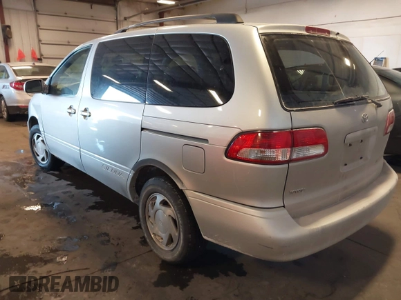 2003 Toyota Sienna LE with VIN 4T3ZF13C53U510457, listed as a IAAI auction lot 41642470 with 219,515 mi miles. Bid and sale history available at carsss.com. Image 3.