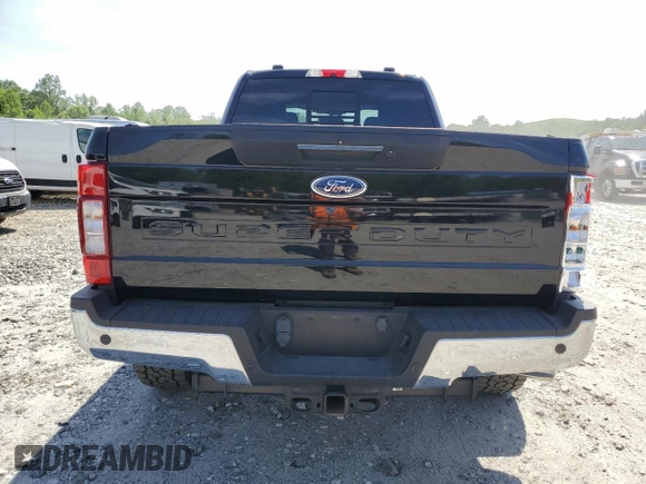 2021 Ford Super Duty F-250 SRW XL with VIN 1FT7W2BT1MEC51277, listed as a Copart auction lot 54199165 with 99,324 mi miles and Salvage Title. Bid and sale history available at carsss.com. Image 6.