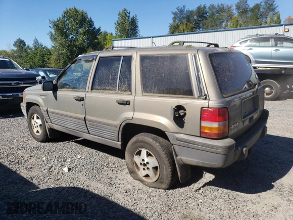 1995 Jeep Grand Cherokee Laredo with VIN 1J4FX58S1SC754691, listed as a Copart auction lot 72858214 with 251,234 mi miles and Salvage Title. Bid and sale history available at carsss.com. Image 2.