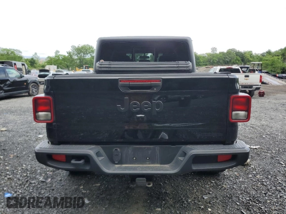 2021 Jeep Gladiator Sport S with VIN 1C6JJTAG4ML583148, listed as a Copart auction lot 59790835 with 48,623 mi miles and Salvage title. Bid and sale history available at DreamBid. Image 6.