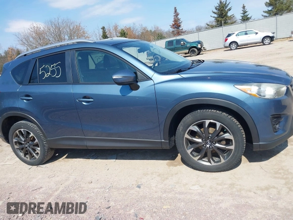 2016 Mazda CX-5 Grand Touring z VIN JM3KE4DY6G0785255, wystawiony jako IAAI lot #41887066 z przebiegiem 171 334 mil mil oraz . Historia ofert i sprzedaży dostępna na DreamBid. Obrazek 14.