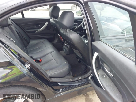 2012 BMW 3 Series 328i with VIN WBA3A5G51CNP17522, listed as a IAAI auction lot 42124868 with 154,385 mi miles and . Bid and sale history available at carsss.com. Image 8.