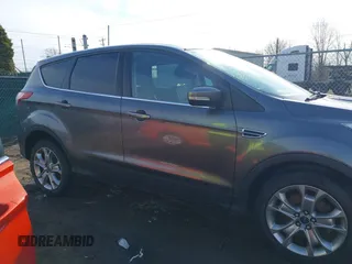 2013 Ford Escape SEL with VIN 1FMCU9H92DUA24934, listed as a IAAI auction lot 41832566 with 124,705 mi miles. Bid and sale history available at carsss.com. Image 13.
