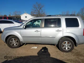 2009 Honda Pilot Touring with VIN 5FNYF48979B008851, listed as a IAAI auction lot 41252736 with 183,292 mi miles and . Bid and sale history available at carsss.com. Image 14.